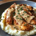 Cremiges Knoblauch-Hähnchen mit Kartoffelstampf